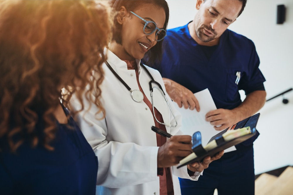 healthcare providers discussing medication-assisted treatment for their patient