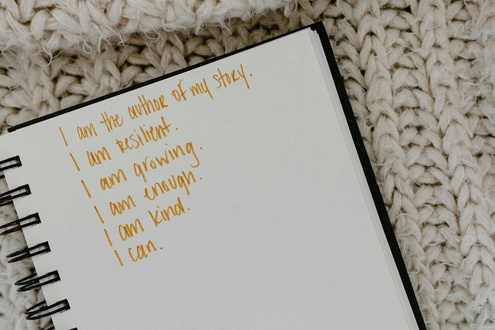 Notebook with positive messages symbolizing motivational interviewing for substance abuse.