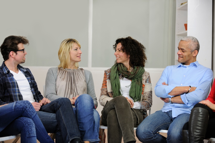 Group therapy session for alcohol use recovery