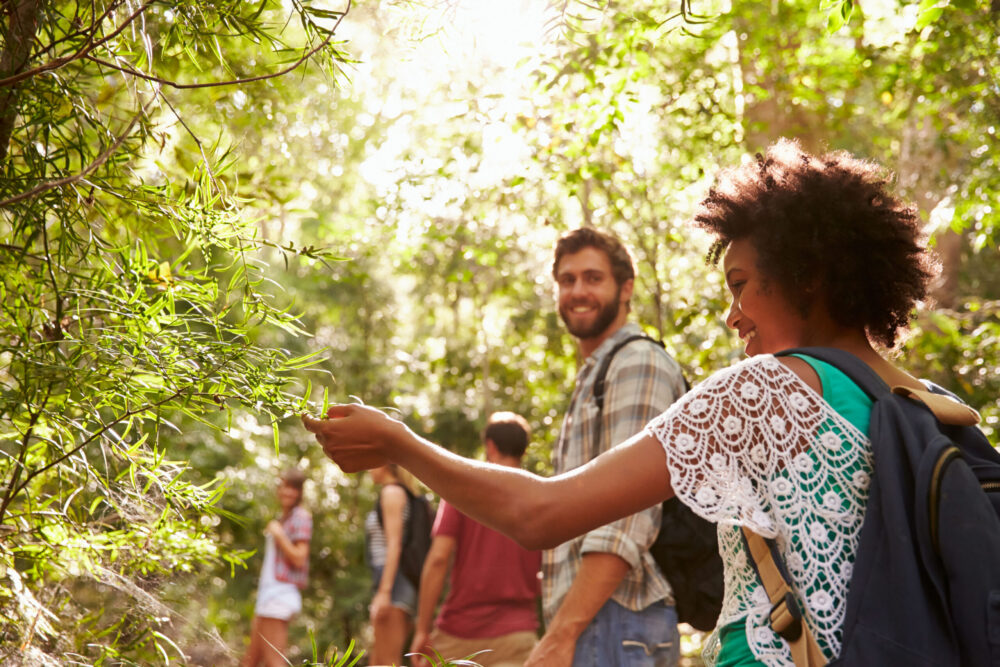 Group of friends enjoying coffee and conversation at a cozy New Jersey cafe without alcohol