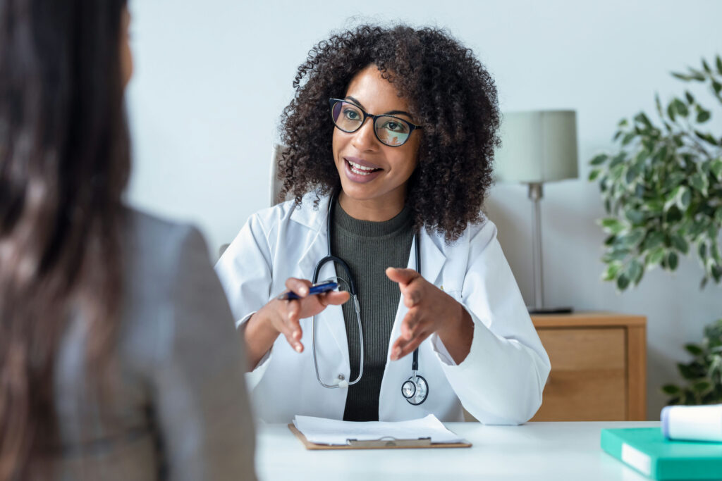 Doctor discussing medication-assisted treatment for opioid dependence with patient