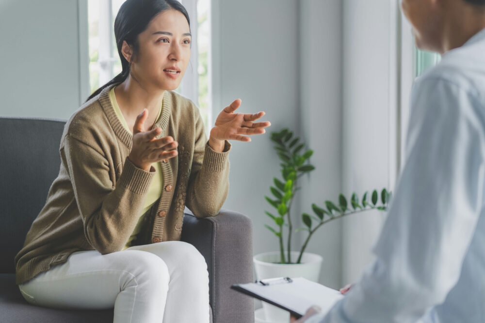 Mental health professional helping someone struggling with alcohol use and antidepressants