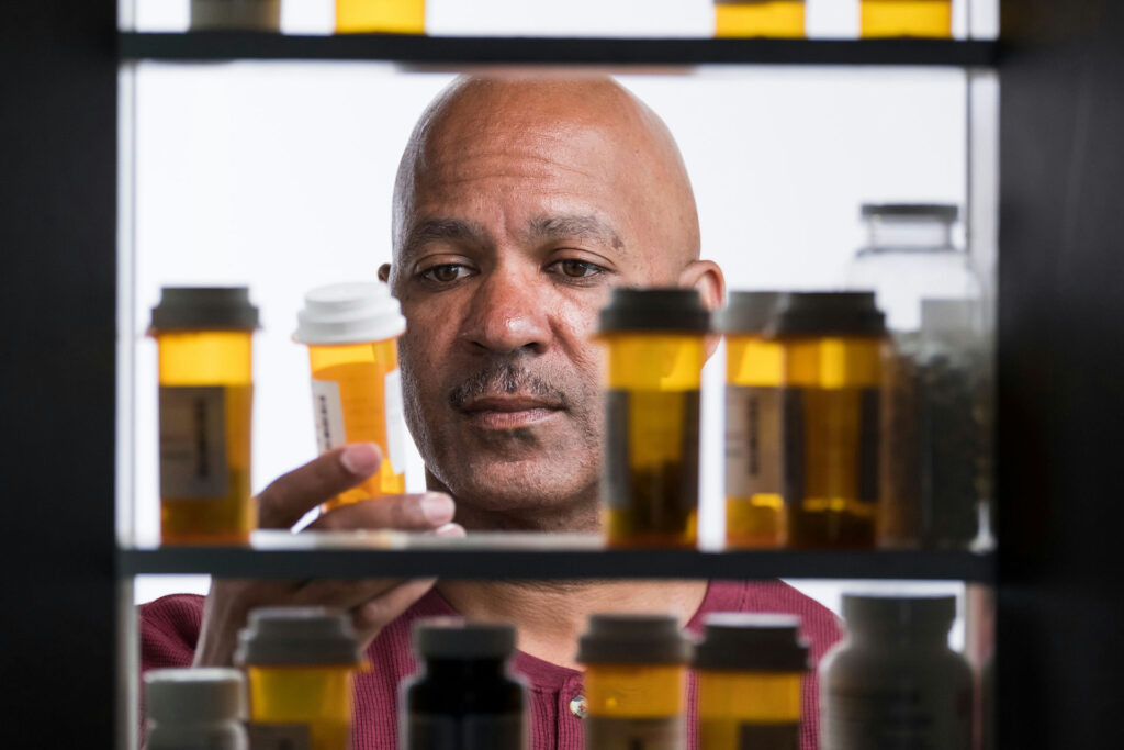 Person considering the risks of mixing Prozac and alcohol while managing mental health symptoms